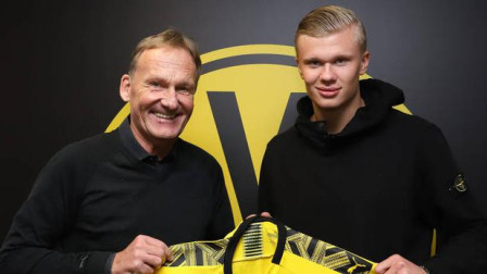 李国旭：英博会保持低调务实作风，让大连足球回到应有位置（李国旭：以英博会的低调务实，推动大连足球重返应有高度）